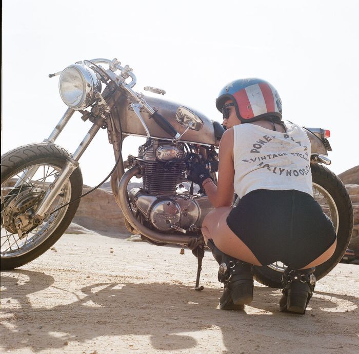 A playful frame from Girls on a motorcycle — online in Casablanca